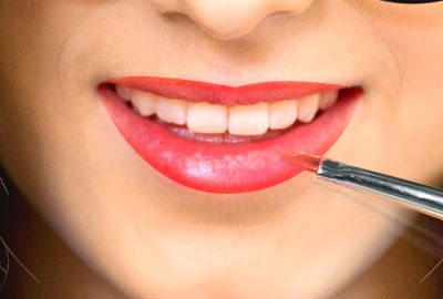 Apply lipstick using a lip brush
